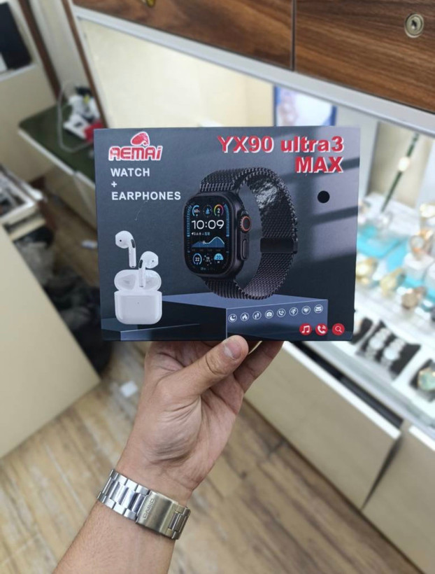ساعت هوشمند مدل YX90 Ultra 3 MAX با بند مشکی سیلیکونی و هندزفریهای بیسیم سفید