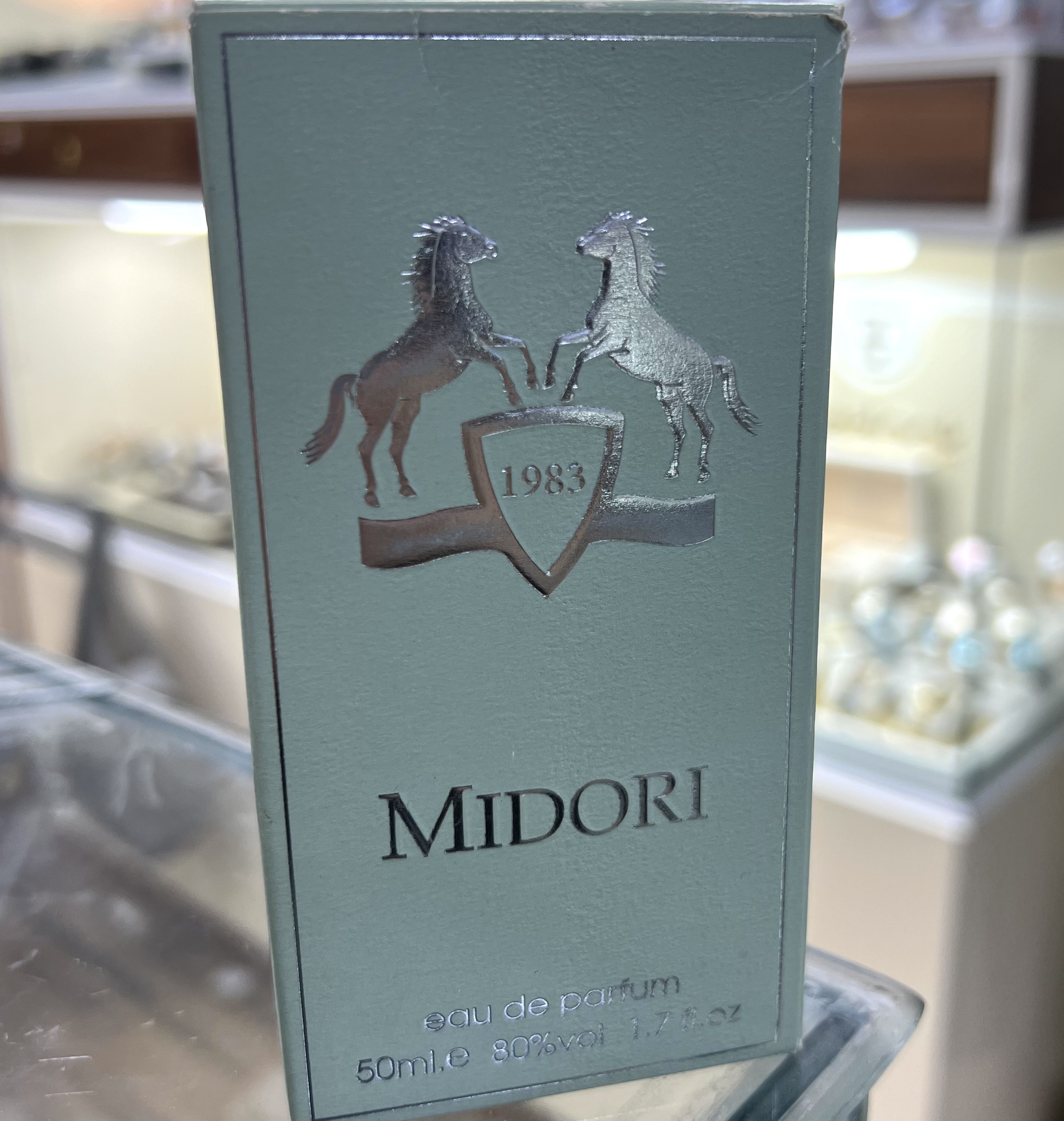 عطر ادوپرفیوم فراگرنس ورد مدل MIDORI حجم 50 میل رایحه شیرین خنک