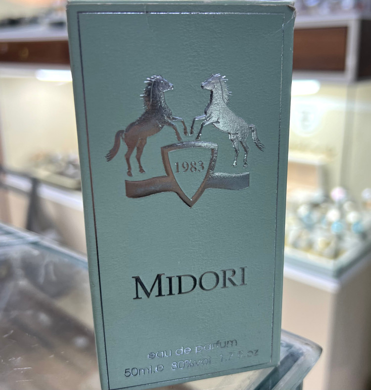 عطر ادوپرفیوم فراگرنس ورد مدل MIDORI حجم 50 میل رایحه شیرین خنک